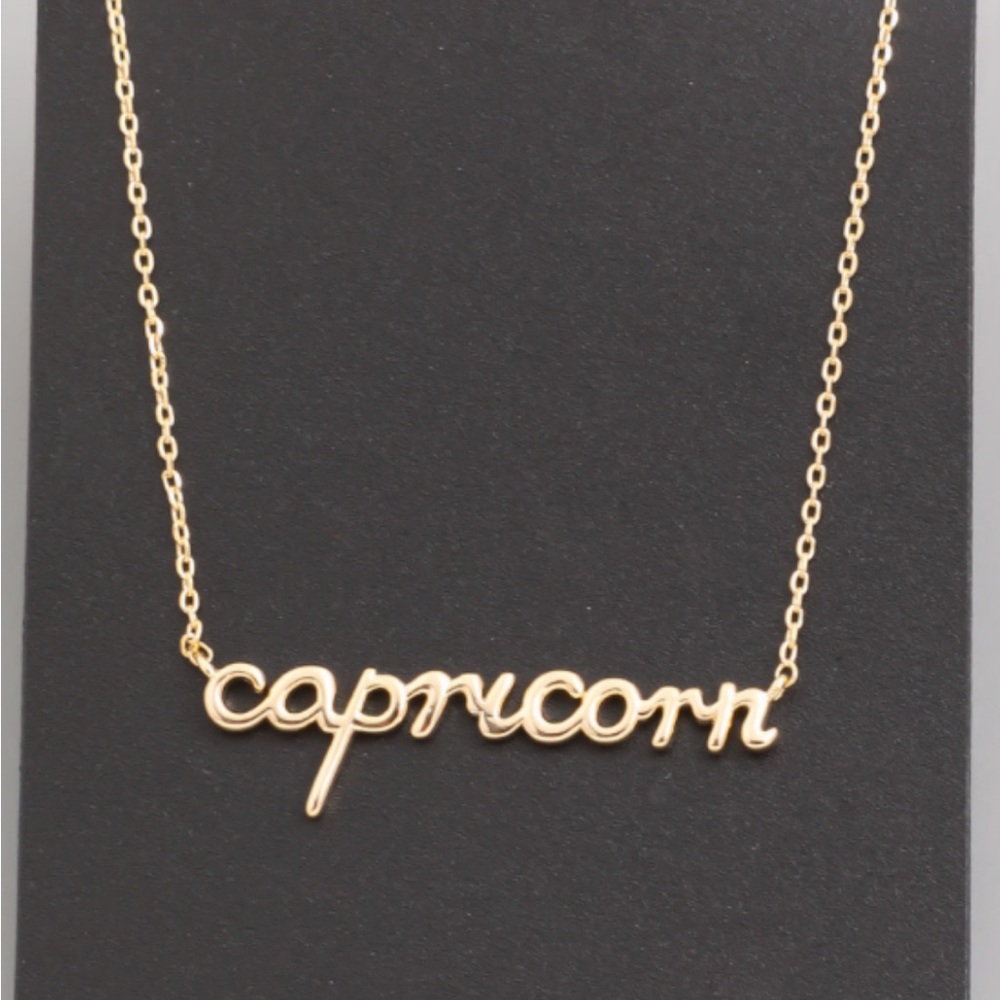Gold zodiac pendant necklace in a fun font.  Makes a great gift.  18" - Picture 10 of 12